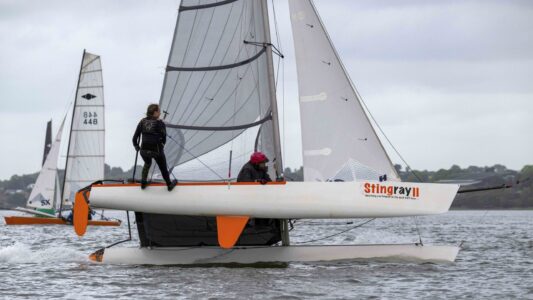 Hurricane Open, end of 1st leg 315 Tesni King, Bill King Starcross YC, goes around the outside,