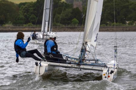 Hurricane Open, 346 Robin Ponting, Caleb Greeves Starcross YC following the few boats head towards the castle and the right side of the course from the start line,